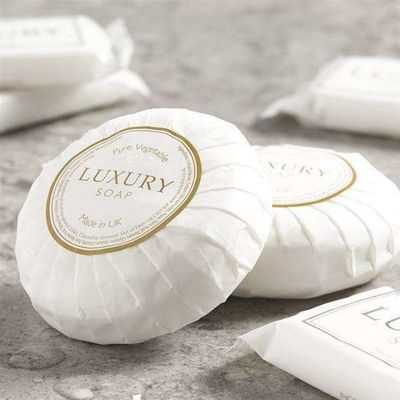 Macchina di avvolgimento di sapone rotondo per imballaggi automatici di sapone per hotel